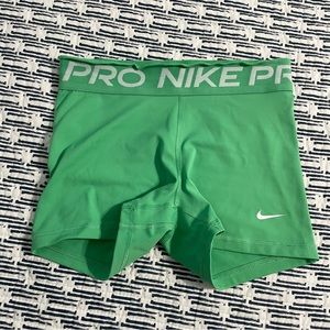 Green Nike pro spandex shorts